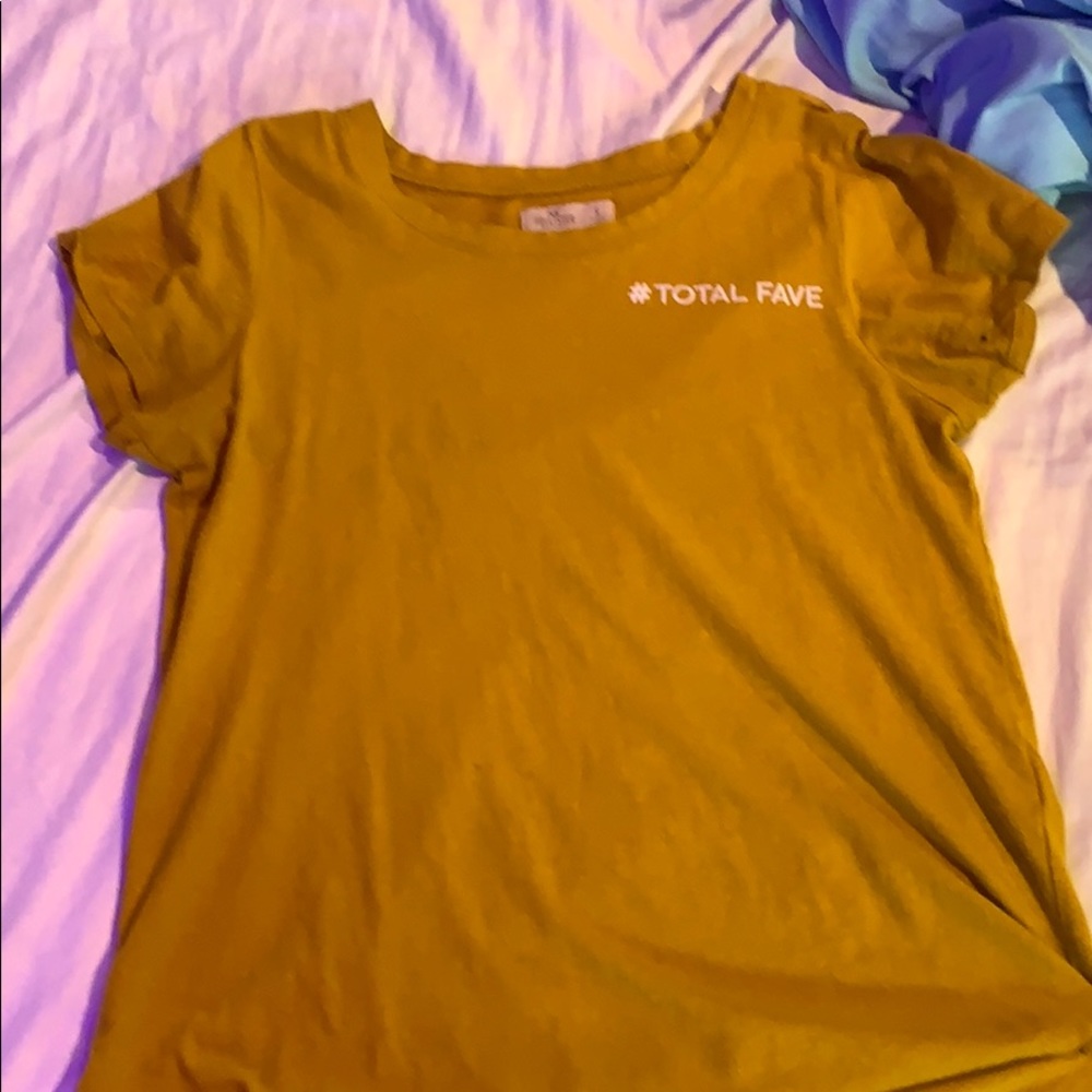 A mustard short-sleeve shirt